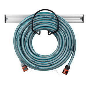 Turquoise garden hose coiled neatly around a black Toolflex hose holder attached to a silver aluminum rail, showcasing a practical and tidy garden hose storage solution.